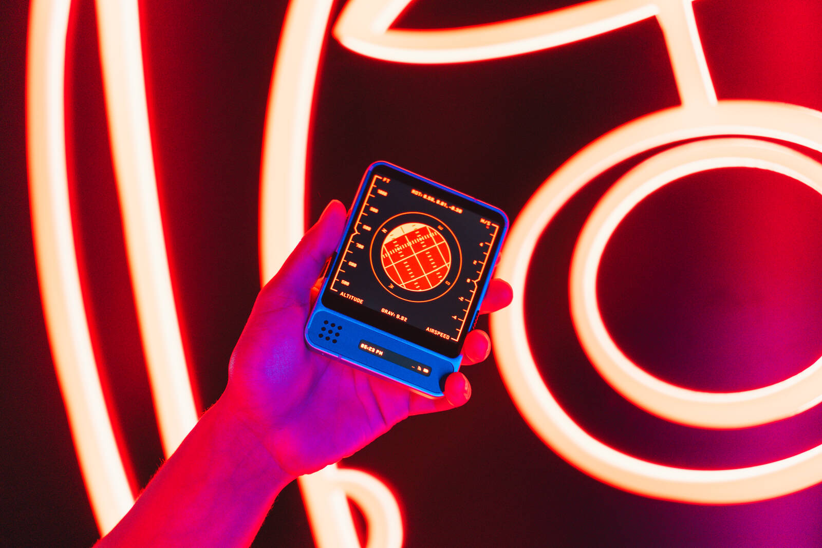 dGEN1 device with red neon background